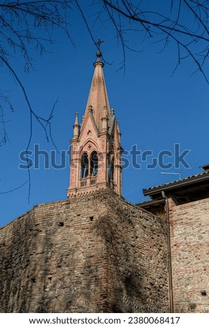 medieval bell tower in small village in Italy. High quality photo