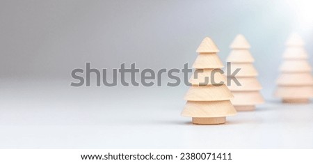 Christmas background in vintage style and Wooden Christmas Trees Decoration with Soft Light.