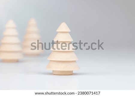 Christmas background in vintage style and Wooden Christmas Trees Decoration with Soft Light.