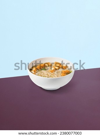Photo of PHO soup on the background. The perfect picture for a poster. Modern food concept. Advertising for a restaurant. The image is fully sharp, front to back.