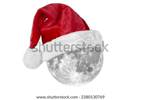 a moon with a Santa Claus hat for Christmas