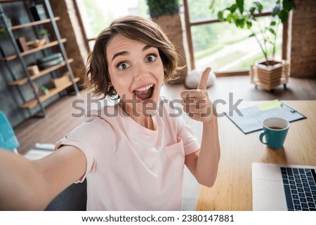 Selfie of young crazy impressed woman thumb up like feedback rate coffee break time for relax while work interior isolated house background Royalty-Free Stock Photo #2380147881