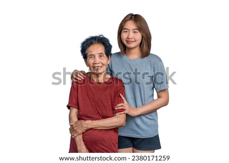 Happy grandmother and granddaughter showing love. Looking at the camera. Granddaughter embracing grandma. Show concern for the relationship in a happy family Picture of love in the family.