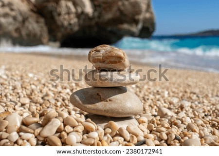 zen stones, meditation concept. stones in a row. against the sea view.