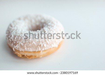 White sweet donut on a white background.