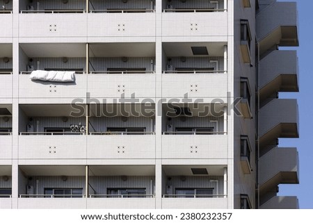 picture of a facade of a high rise residential building in Tokyo, Japan
