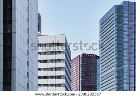 picture of high rise buildings with blue sky in Tokyo, Japan