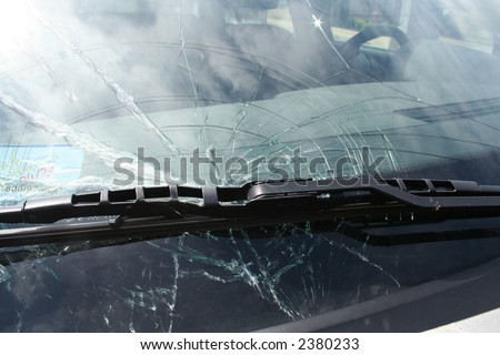 Closeup of a broken car windshield. Royalty-Free Stock Photo #2380233