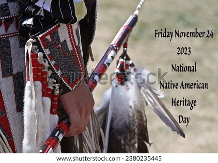 National Native American Heritage Day Friday November 24 2023. Banner text original photo. Indigenous man in regalia. Education. Pride. Awareness. Contributions. Culture. Powwow. Indian. Recognition. Royalty-Free Stock Photo #2380235445