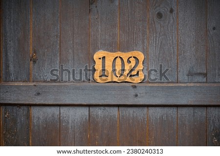 Hotel door number, close up image.