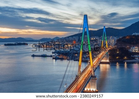Night view of Yeosu Port and Dolsan Bridge Royalty-Free Stock Photo #2380249157