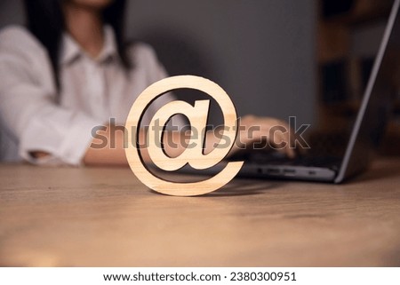 businesswoman hand holding email icon. internet and networking concept. email marketing.