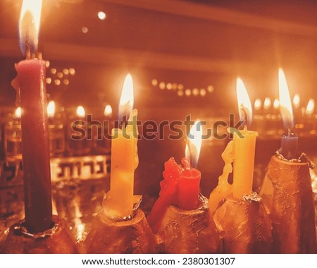 Chanukah candles burning bright stock photo. Bright, light, colorful, menorah, flame, fire, burning, inspiration, celebration. Chanukah Sameach. Jewish holiday. Happy Chanukah. Stock photo. Image.