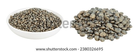 raw french green lentils in ceramic bowl isolated on white background with full depth of field