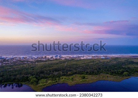 Aerial view of the Gulf State Park in Gulf Shores, Alabama at sunrise Royalty-Free Stock Photo #2380342273