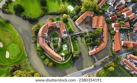 Aerial drone view water castle Wasserschloss Burgsteinfurt Steinfurt, North Rhine-Westphalia, Germany. High quality photo