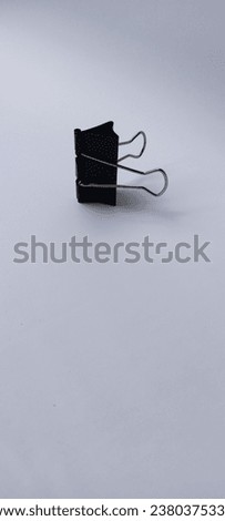 Binder Paper Clip or Black Paper Clip For Office isolated on White Background.