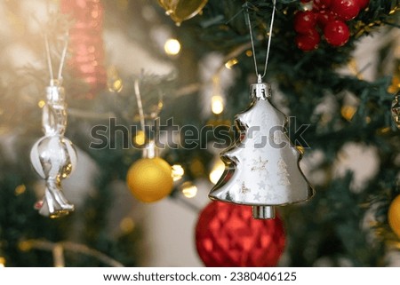 Elegant Christmas Tree Decorations - Exquisite Christmas ornaments adorn a beautifully dreamy backdrop, creating a picture of holiday enchantment