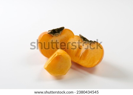 Japanese persimmons on white background