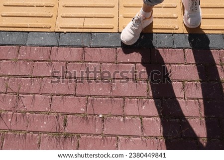 outdoor tactile pavement foot path for blind and visually impaired disabled people