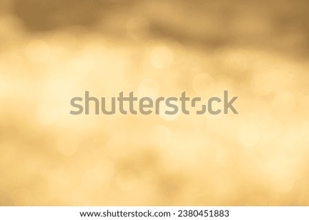 ABSTRACT GOLDEN YELLOW BOKEH LIGHTS BACKGROUND FOR FESTIVE USAGE