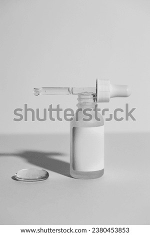Sterile Cosmetic or Medical Pipette, Elegance. Precision in a sleek design, skincare or pharmaceutical branding. High-quality aesthetics. Cosmetic and medical product mockup in black and white . 
