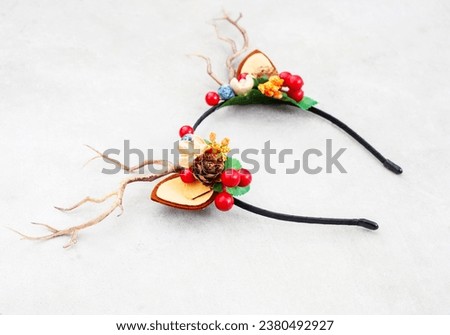 forest fantasy dress up deer antlers on hairband Royalty-Free Stock Photo #2380492927