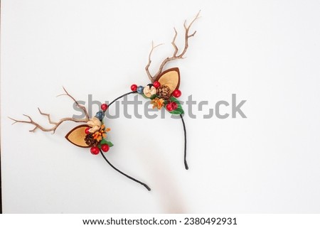 forest fantasy dress up deer antlers on hairband Royalty-Free Stock Photo #2380492931