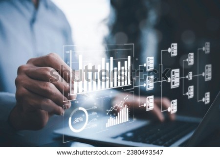 Working Data Analytics and Data Management Systems and Metrics connected to corporate strategy database for Finance, Intelligence,  Business Analytics with Key Performance Indicators, social network   Royalty-Free Stock Photo #2380493547