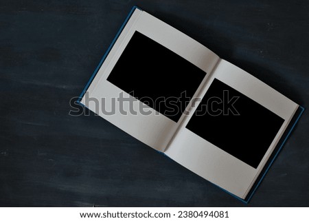open book with empty picture frames,free space for pics and copy