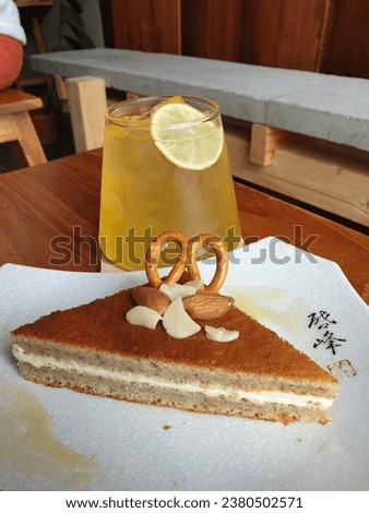 Photograph of honey lemon soda drink and dessert