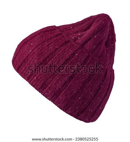 burgundy hat isolated on white background .knitted hat . Royalty-Free Stock Photo #2380525255