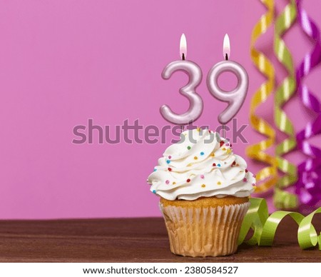Birthday Cake With Candle Number 39 - On Pink Background.