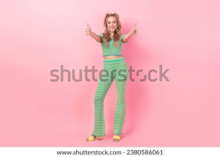 Full length photo of lovely young lady double thumb up good quality wear trendy green print garment isolated on pink color background
