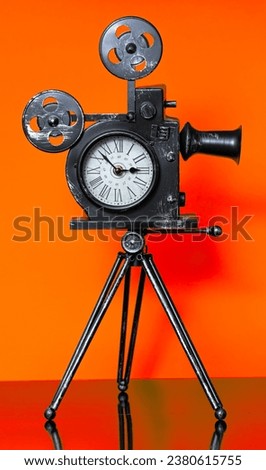 modern clock in an old camera
