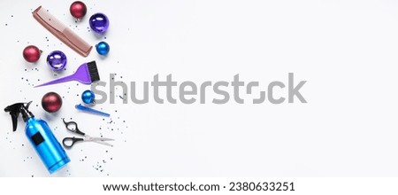 Hairdresser's supplies with Christmas balls on white background with space for text