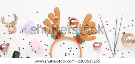 Dentist's supplies with Christmas decor on white background