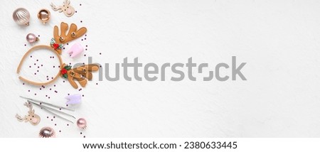 Dentist's supplies with Christmas decor on white background with space for text