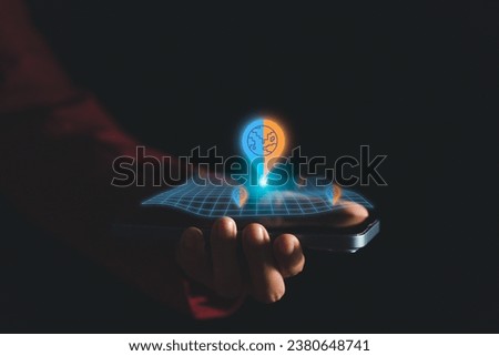 Navigate the digital landscape with a virtual screen displaying a map network on a smartphone. Uncover the possibilities of data connections and location tracking with this captivating image Royalty-Free Stock Photo #2380648741