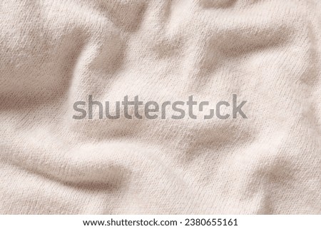 Cashmere fabric background, close-up view Royalty-Free Stock Photo #2380655161