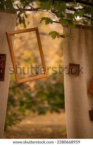 Autumn style. Decorations for the photo zone. Empty picture frames. Artist's style
