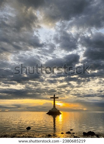 Sunset over the Sunken Cemetery. Beautiful sky and clouds. Camiguin Island. Philippines. Royalty-Free Stock Photo #2380685219