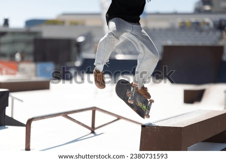 Skater balancing at the edge of a ramp