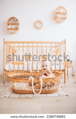 Child in a crib. Child in the children's room. Laughing child