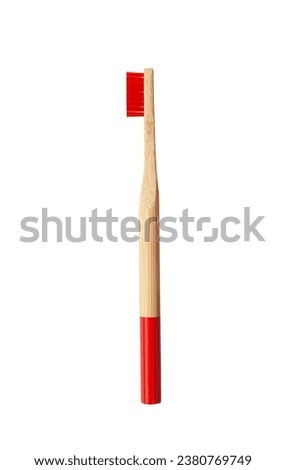 Red wooden bamboo toothbrush isolated on white background. Natural organic dental tooth care protection. Mock up, template Royalty-Free Stock Photo #2380769749