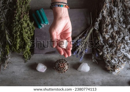 woman holding garlic with her hands for spiritual and traditional ritual of the Latin American region or in Mexico