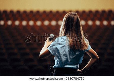 
Businesswoman Preparing to Give a Public Speech Rehearsing it. Spokeswoman practicing alone before giving a public presentation 
 Royalty-Free Stock Photo #2380784751