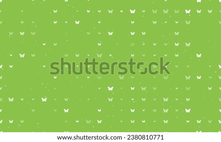 Seamless background pattern of evenly spaced white butterfly symbols of different sizes and opacity. Vector illustration on light green background with stars