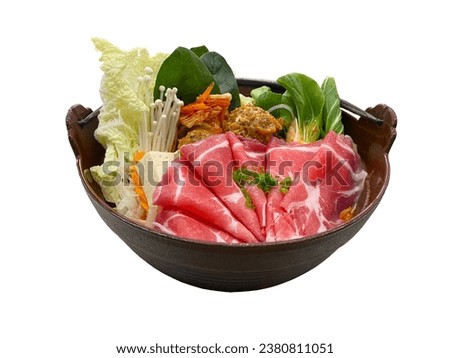 Isolate Hot pot delights Shabu Shabu and Sukiyaki Royalty-Free Stock Photo #2380811051