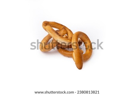 Ring shape dry pretzels stack, isolated on white background